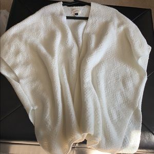 White knitted long throw over sweater